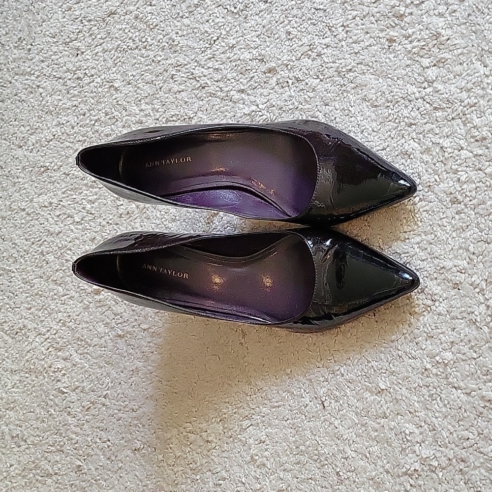 Dark purple pumps